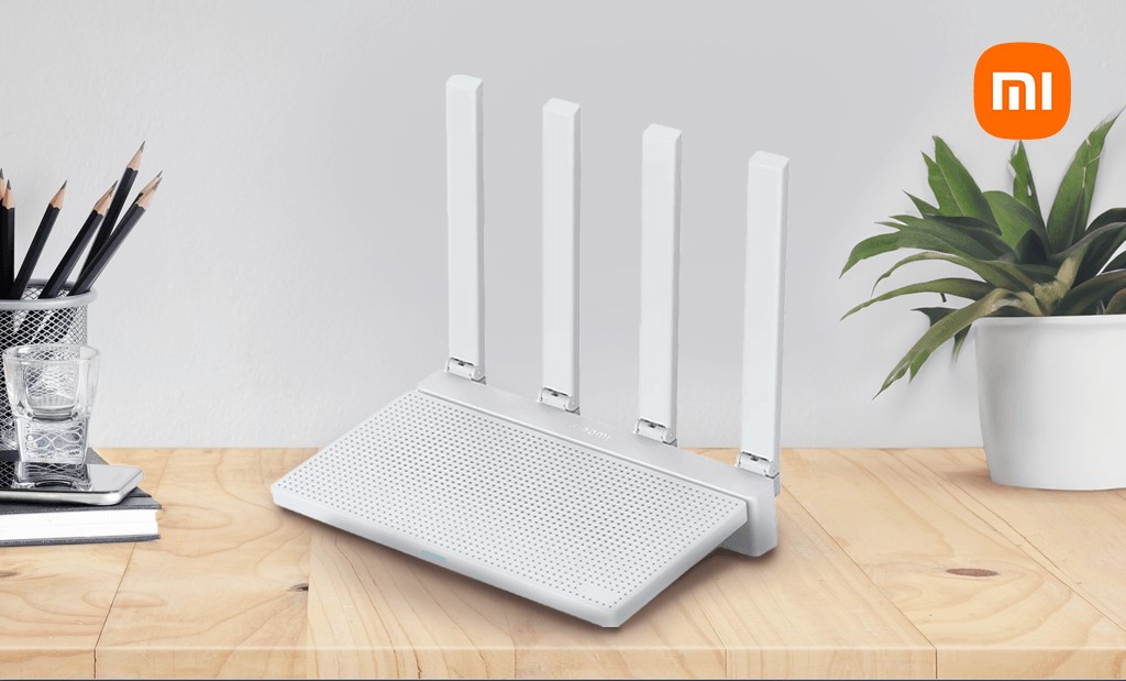 Xiaomi AX3000 WiFi 6 router egy íróasztalon, elegáns munkakörnyezetben elhelyezve.