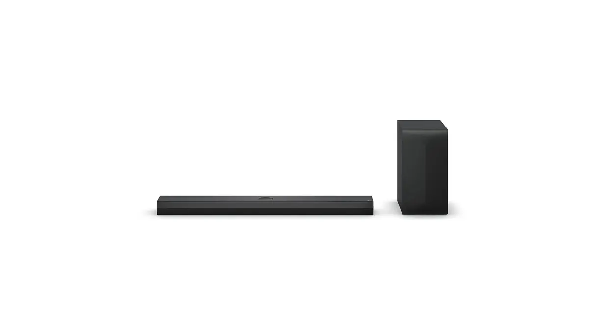 Die LG DS70TY liegt neben einem Subwoofer.