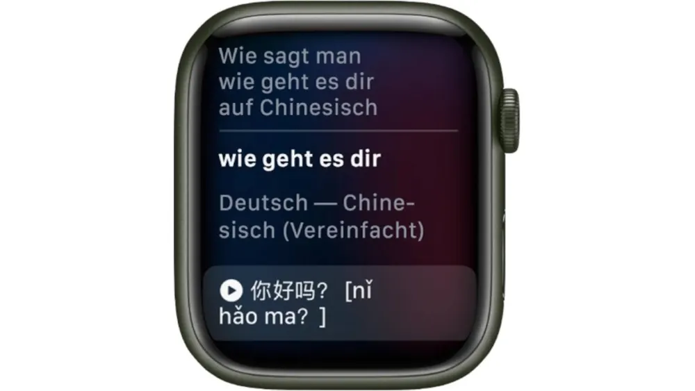 Nahaufnahme einer Smartwatch mit der Frage "Wie sagt man, wie geht es dir auf Chinesisch?" auf dem Bildschirm.