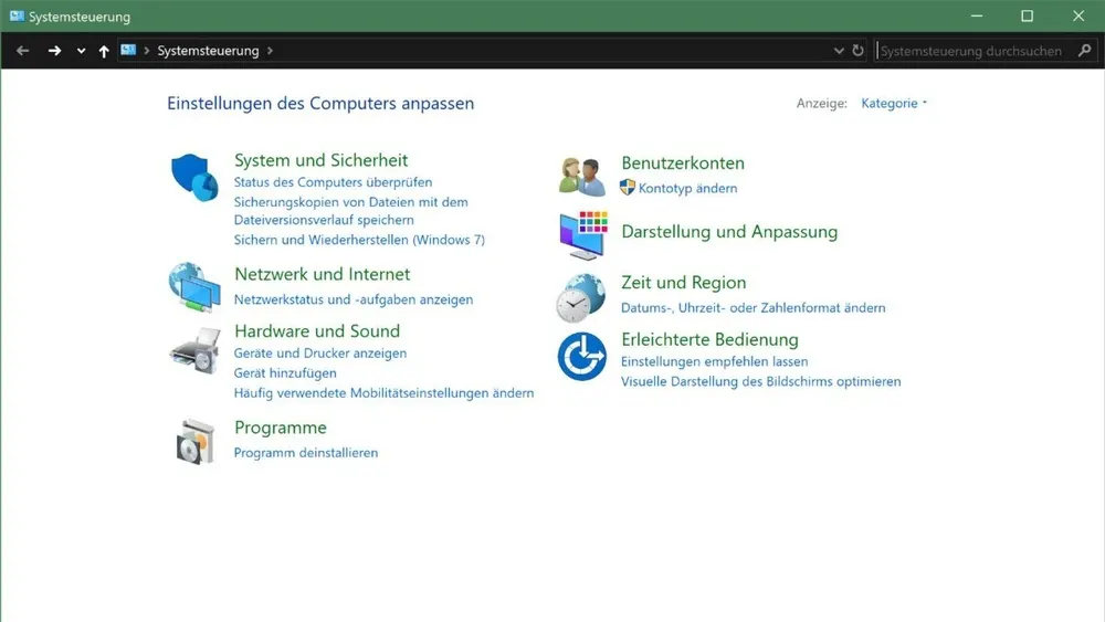 Die Systemsteuerung zeigt Optionen wie System, Sicherheit, Netzwerk, Hardware, Programme, Benutzerkonten, Darstellung, Zeit und Bedienung.