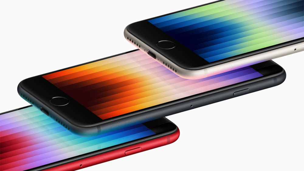 Mehrere Apple iPhone SE in verschiedenen Farben liegen übereinander.