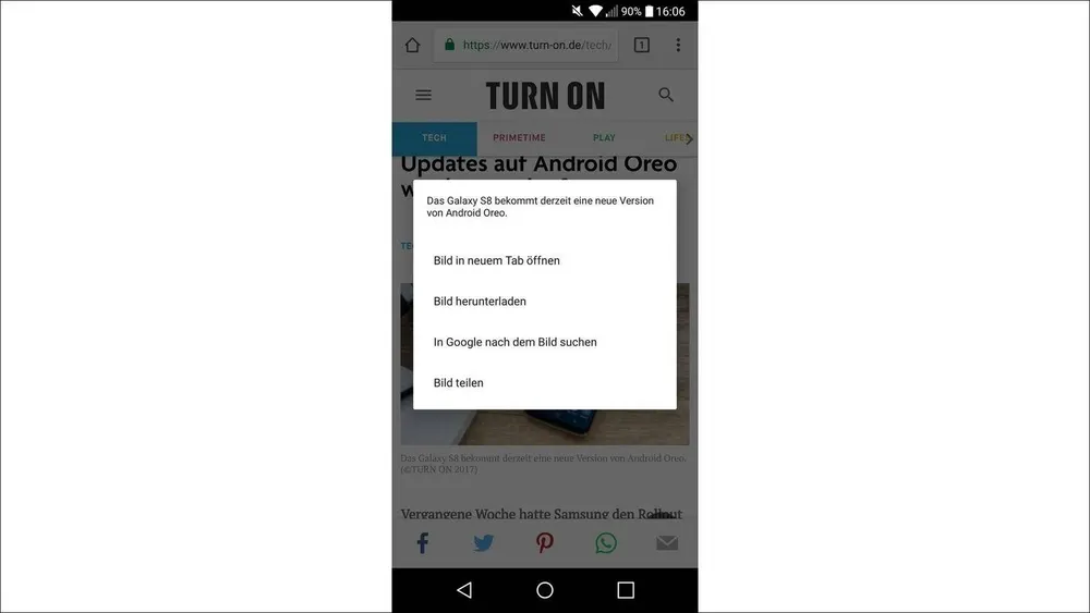 Smartphone-Bildschirm zeigt ein Menü mit Optionen wie "Bild in neuem Tab öffnen" und "Bild herunterladen". Die Seite ist auf Deutsch.