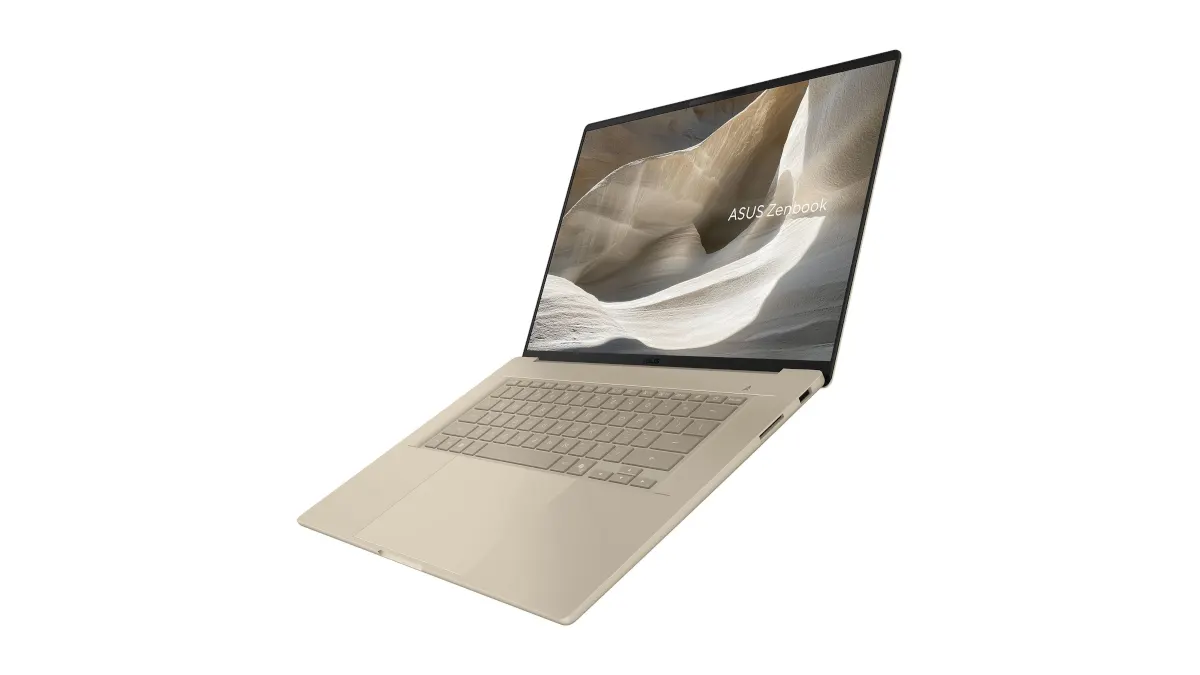 Der Laptop Asus Zenbook A16 schwebt aufgeklappt vor einem weißen Hintergrund.