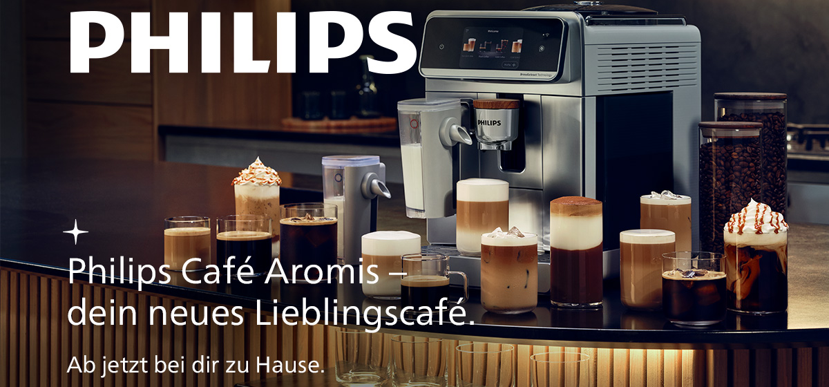 Eine Philips Kaffeemaschine mit verschiedenen Kaffeespezialitäten und Kaffeebohnen in einem Glasbehälter. Der Hintergrund ist blau.