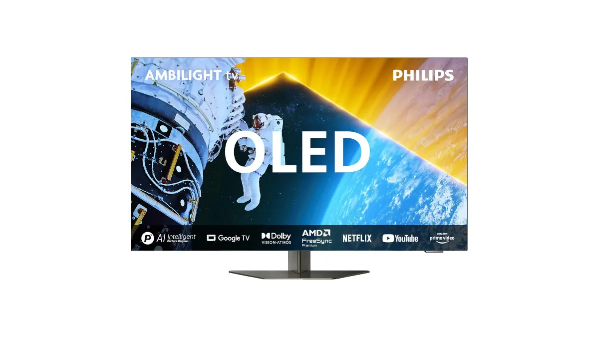 Ein Philips OLED-Fernseher zeigt einen Astronauten vor der Erde. Logos für Google TV, Netflix und Prime Video sind sichtbar.