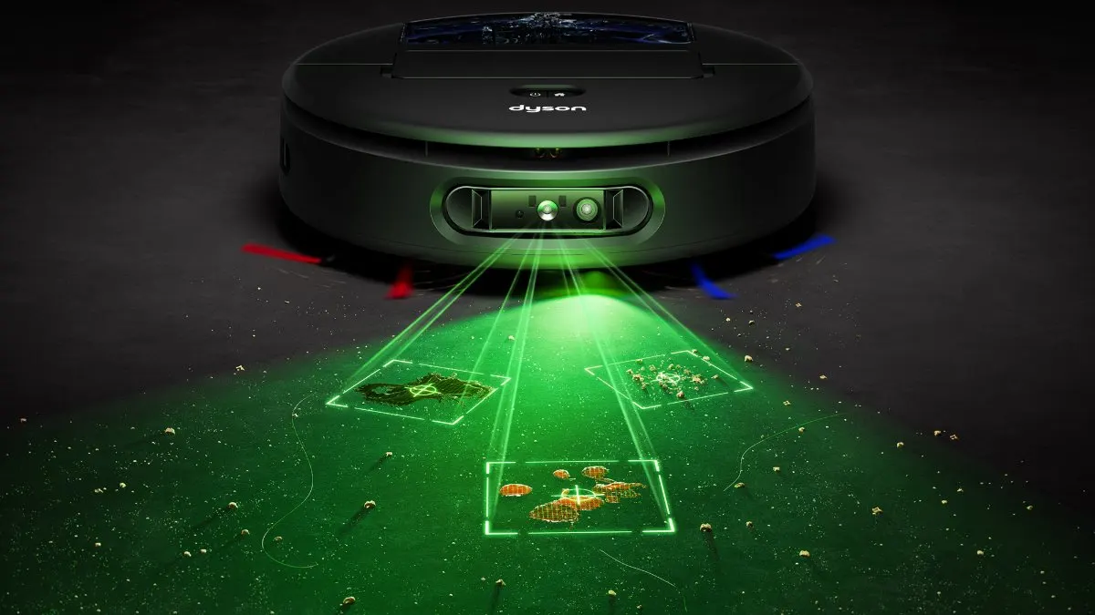 Der Saugroboter Dyson Spot+Scrub Ai scannt mit einer grünen LED-Beleuchtung den Boden.