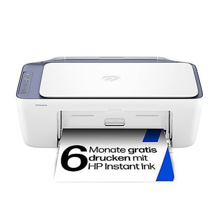 Weißer HP-Drucker mit blauem Rand, aus dem ein Blatt mit „6 Monate gratis drucken mit HP Instant Ink“ kommt.