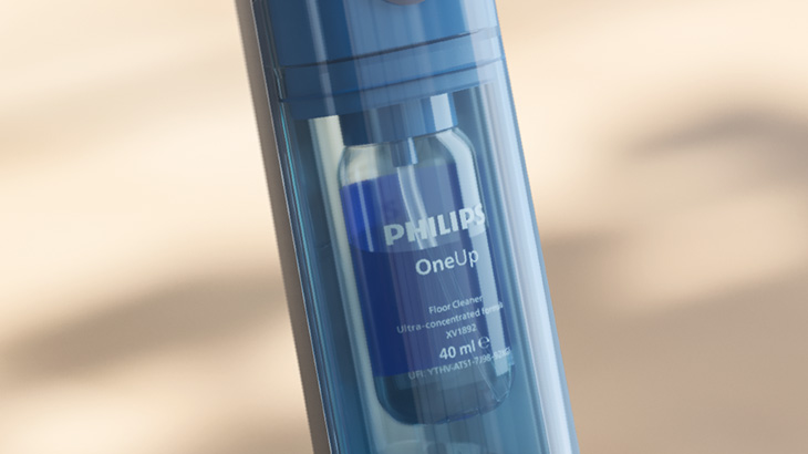 Das Bild zeigt den Philips OneUp Bodenreiniger. Der blaue Reiniger verspricht Sauberkeit und ist haustier- und familienfreundlich.
