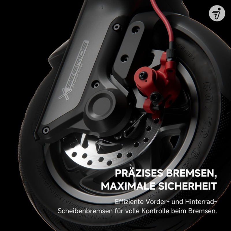 Nahaufnahme des SEGWAY Ninebot F3 Pro D Vorderrads mit Bremsscheibe und rotem Bremssattel