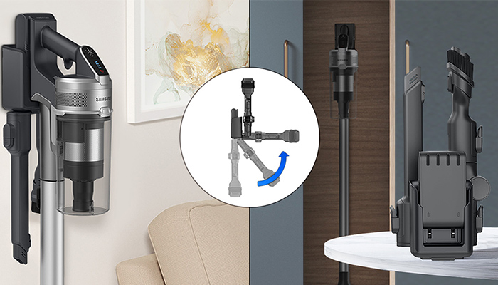 Ein Staubsauger an einer Wandhalterung, ein Zubehörteil mit blauem Pfeil und eine Ladestation stehen auf einem Tisch.