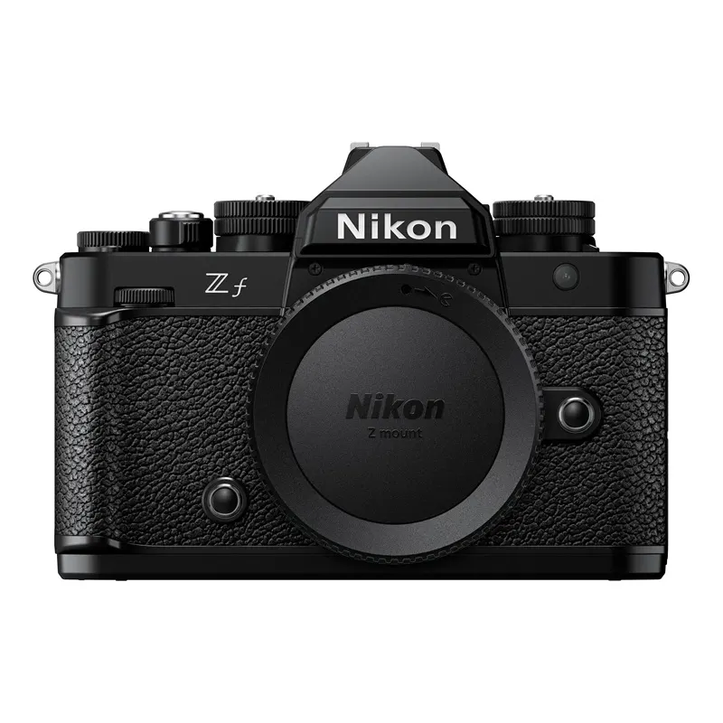 NIKON Z f Gehäuse Systemkamera, 8 cm Display Touchscreen, WLAN Nikon Z f Systemkamera in Schwarz mit aufgesetztem Z-Mount-Objektivdeckel, Frontalansicht. Hybrid-AF mit 273 Messfeldern für präzise Motiverkennung dank EXPEED 7-Prozessor.
