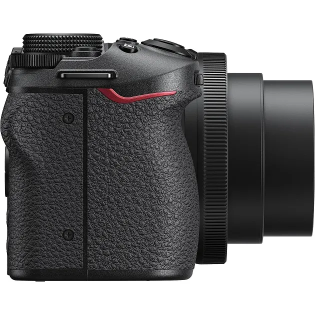 NIKON Nikon Z30 Kit Systemkamera mit Objektiv 16-50 mm, 7,5 cm Display Touchscreen, WLAN Eine schwarze Kamera mit strukturiertem Griff und einem Objektiv mit geriffelten Ringen steht auf einem weißen Hintergrund.