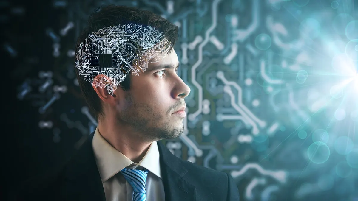 Ein Mann mit einem Chip im Kopf blickt in Richtung eines Lichts.