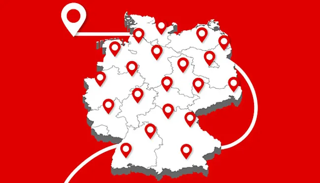 Deutschlandkarte mit roten Positionsmarkierungen auf rotem Grund, eine Markierung ist abgesetzt.