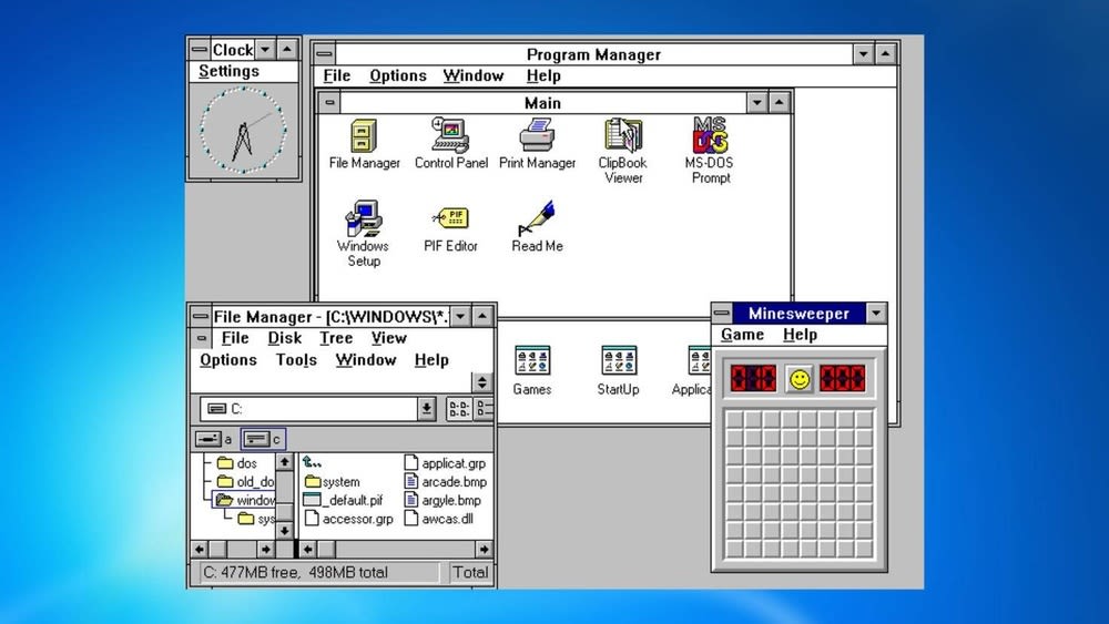 Es ist die Desktop-Oberfläche von Windows 3.1 zu sehen.