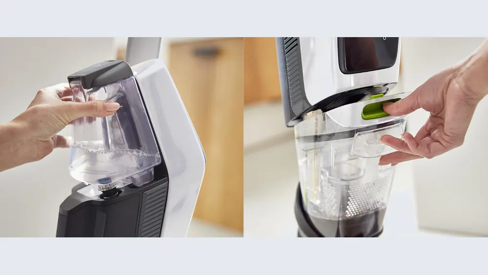 Zwei Hände entfernen transparente Behälter von einem weißen und schwarzen Nass-Trockensauger. Der linke Behälter ist mit Wasser gefüllt.