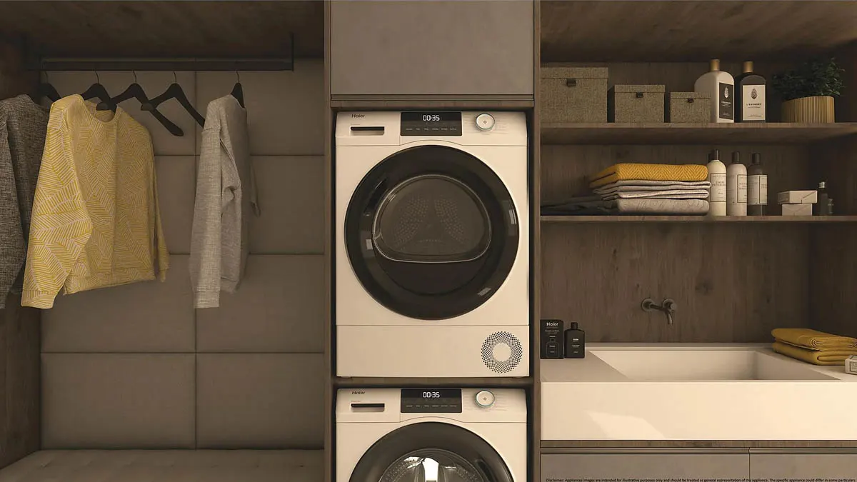 Der Wärmepumpentrockner Haier HD80-E929E-DE Series 929 ist über einer Waschmaschine in eine Schranknische integriert.