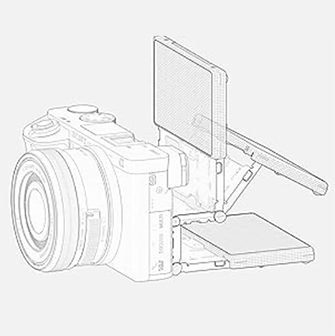 Skizze einer Kamera mit einem Objektiv links und einem hochgeklappten, rechteckigen Bildschirm rechts.