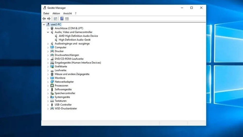 Ein geöffnetes, weißes Fenster des Geräte-Managers mit einer Liste von Hardware- und Softwarekomponenten auf blauem Hintergrund.