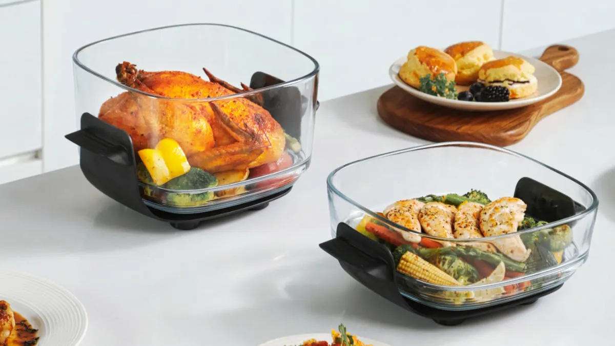 Die beiden Behälter des Dreame Tasti mit verschiedenen Gerichten.