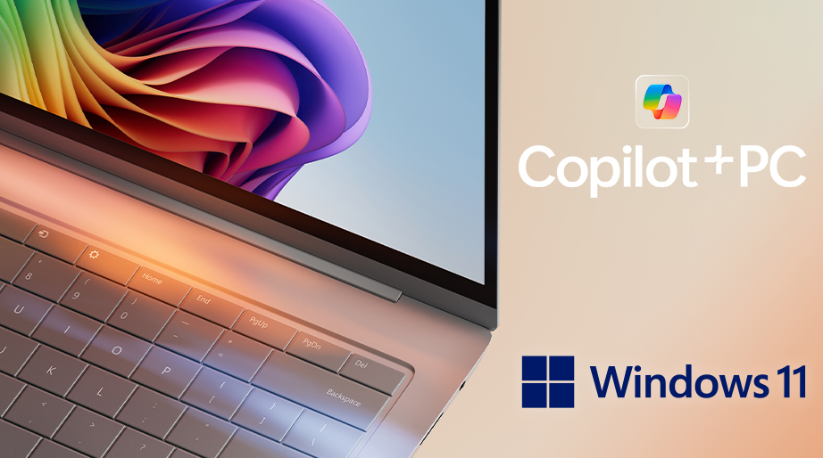 Ein Laptop mit farbigem Bildschirm. Rechts sind die Logos von "Copilot+PC" und "Windows 11" zu sehen.