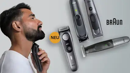 Ein Mann rasiert seinen Bart mit einem Trimmer. Mehrere Braun-Bartschneider liegen auf einem grauen Hintergrund. "NEU" und "BRAUN" sind sichtbar.