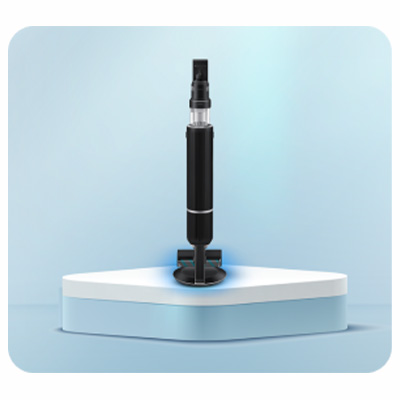 Czarny waporyzator na białym bloku z niebieskim tłem. Urządzenie ma cylinder i ustnik. Dolna część jest na podstawie.