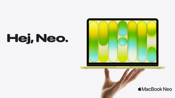 Hej, Neo, MacBook zielony stojący na dłoni, na szarym tle.