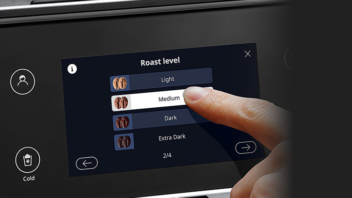 Ekran urządzenia z menu wyboru stopnia palenia kawy: jasny, średni, ciemny i bardzo ciemny. Palec dotyka opcji "średni".