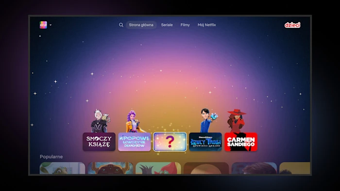 kran startowy profilu "Dzieci" na Netflixie z fioletowym tłem w gwiazdy. W centralnej części widoczne są postacie z animacji takich jak "Smoczy Książę" i "Łowcy Trolli" oraz pudełko niespodzianki.