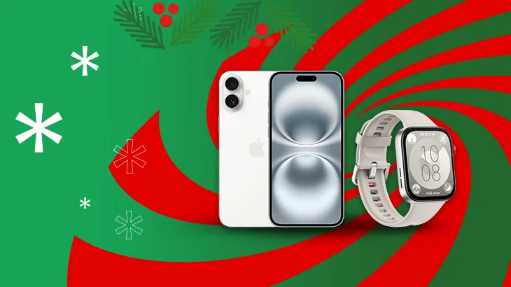 Na zielono-czerwonym tle leżą biały telefon i zegarek, widoczne są płatki śniegu i gałązki z czerwonymi jagodami.