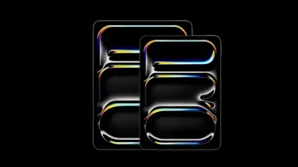 Dwa czarne prostokątne kształty na czarnym tle, z kolorowymi obwódkami, tworzące iluzję głębi i trójwymiarowości.