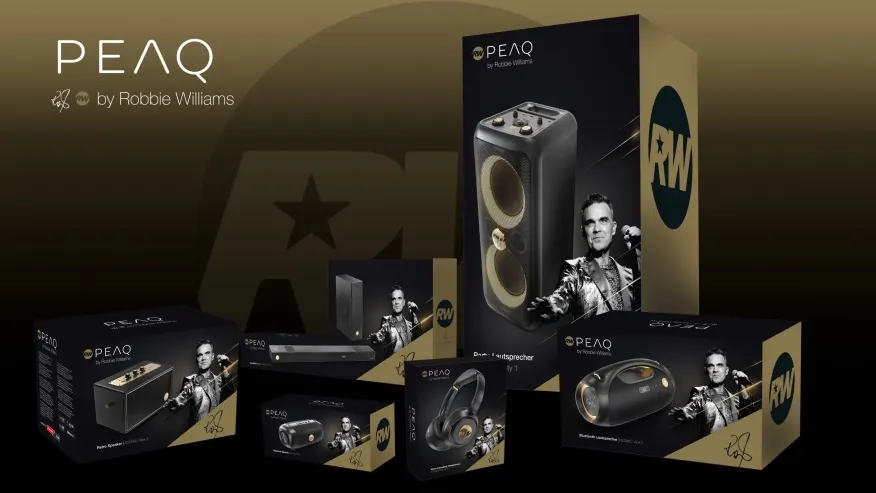 Na czarnym tle widoczne są opakowania produktów PEAQ, w tym głośniki, słuchawki i soundbar, z wizerunkiem Robbiego Williamsa.