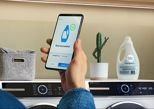 i-DOS wie, ile potrzeba – niezależnie od rodzaju detergentu.  Przedstawiono aplikacje i-dos na tle pralek