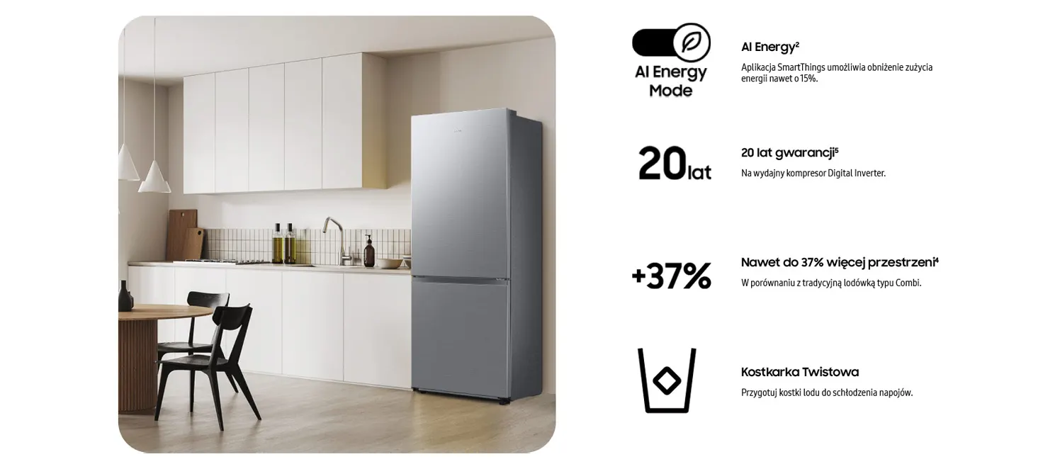 Szara lodówka na tle kuchni z białymi szafkami, stołem i krzesłami. Po prawej stronie informacje o produkcie.