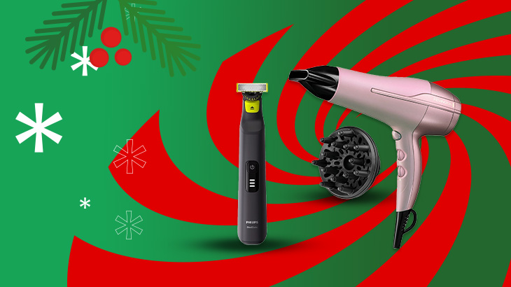 Na zielonym tle z czerwonymi spiralami leżą golarka, suszarka do włosów i dyfuzor. Jest też grafika z motywami świątecznymi.