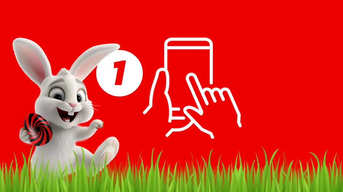 Królik trzymający jajko, obok liczba 1 oraz smartfon z dłońmi trzymającymi go. Czerwone tło oraz trawka u dołu.