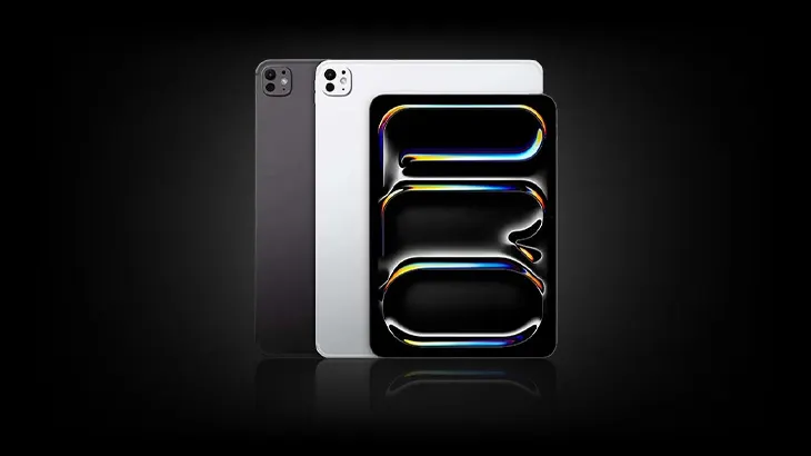 Na czarnym tle widoczne są trzy tablety: szary, biały i czarny z kolorowym wzorem na ekranie.