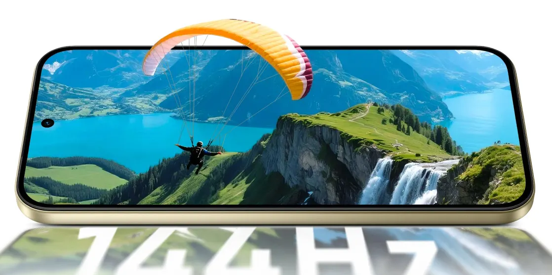 Telefon realme 16 pro 5g wyświetlający zapierający dech w piersiach widok: paralotniarz na tle wodospadu, turkusowego jeziora i gór. Na dole ekranu widoczna jest informacja '144Hz'.