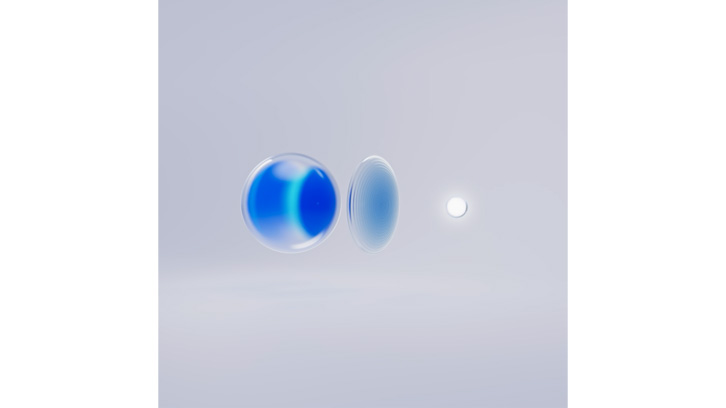 Na jasnym tle znajdują się niebieskie kule i biały okrąg, ułożone poziomo.