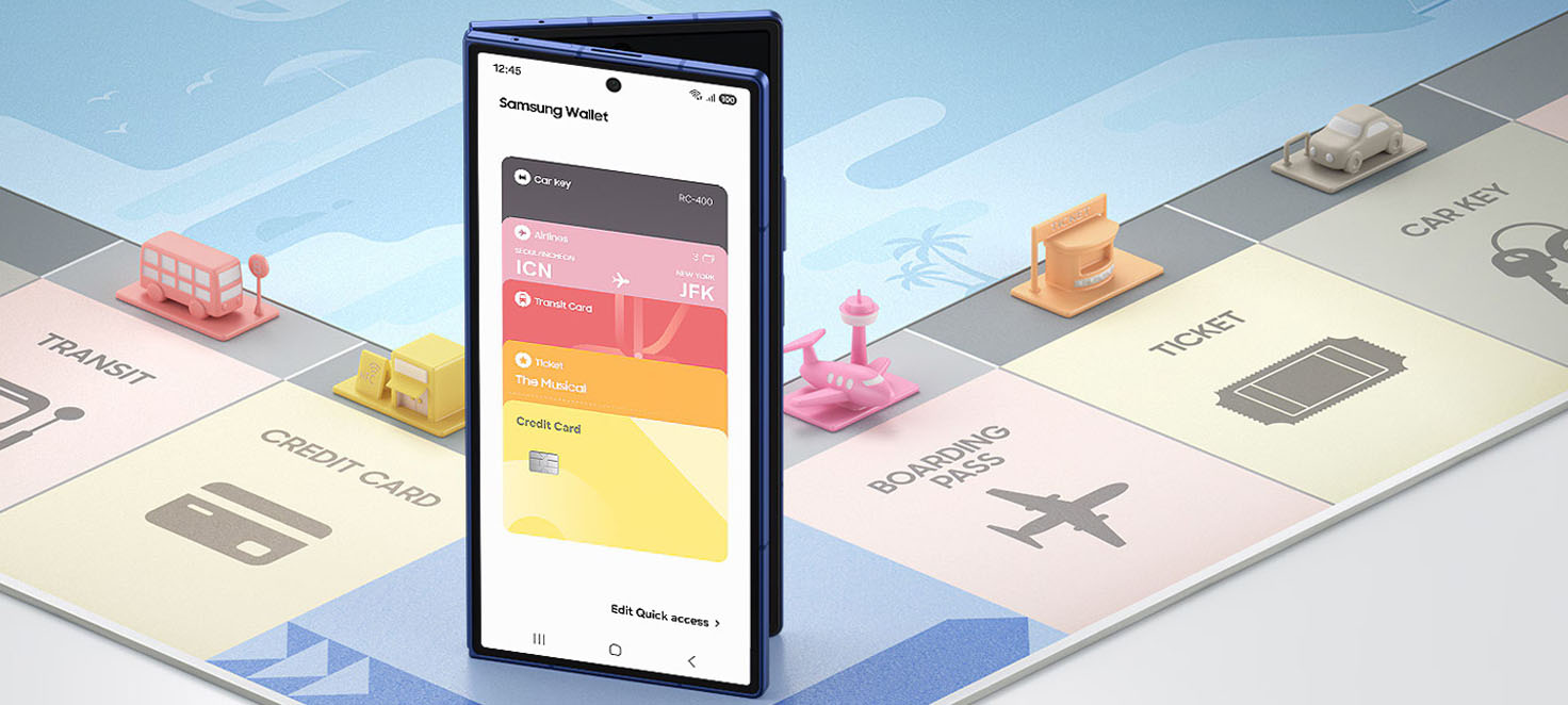 Plansza do gry w "Monopoly" z telefonem na którym otwarta jest aplikacja Samsung Wallet