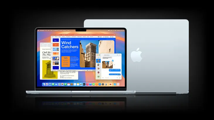 Srebrny laptop z otwartym ekranem, na którym wyświetlane są okna aplikacji i dokumenty. Obok stoi zamknięty laptop z logo Apple.