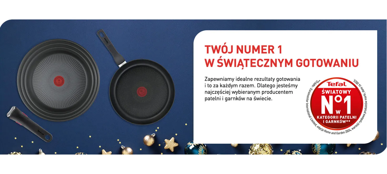 Reklama Tefal: dwa czarne naczynia kuchenne, napis "Twój numer 1 w świątecznym gotowaniu", dekoracje świąteczne.