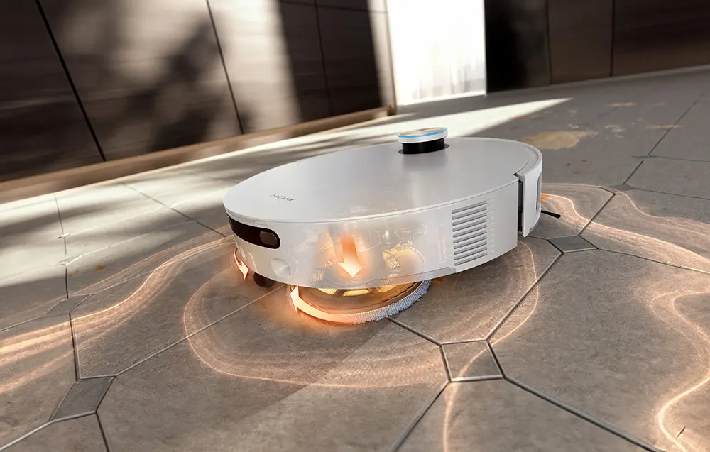 Na grafice widać sprzątający robot DREAME X60 Ultra Complete Biały