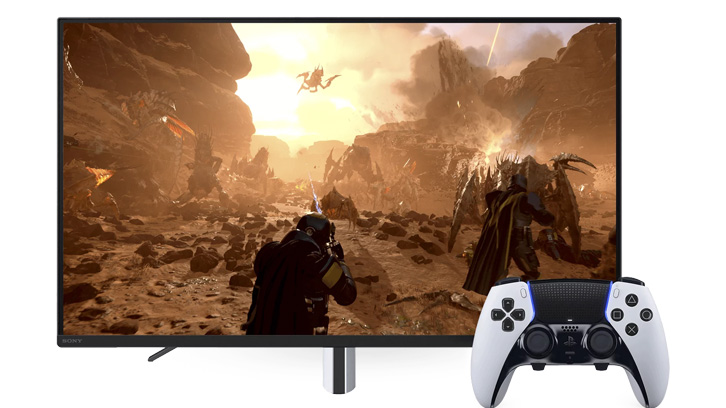 Ekran telewizora pokazuje grę akcji z postacią i kontroler do gier na pierwszym planie. Tło to pustynny krajobraz z formacjami skalnymi.