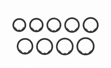 Na białym tle znajduje się dziesięć czarnych pierścieni ułożonych w dwóch rzędach po pięć elementów.