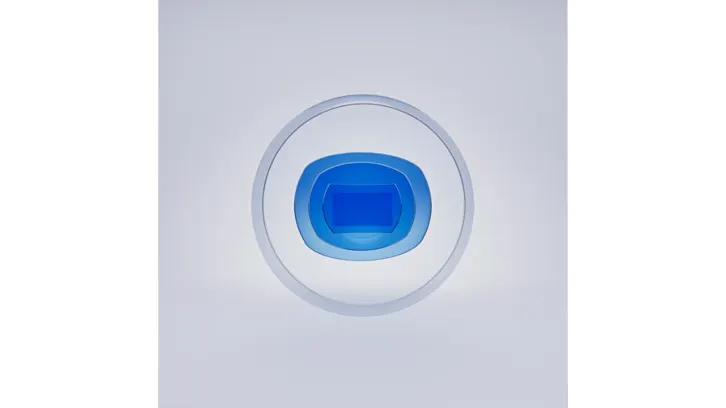 Na białym tle widoczny jest okrąg z niebieskim środkiem, tworzący efekt głębi.