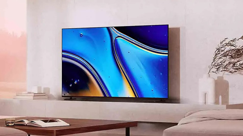 Telewizor Sony Bravia na beżowej ścianie