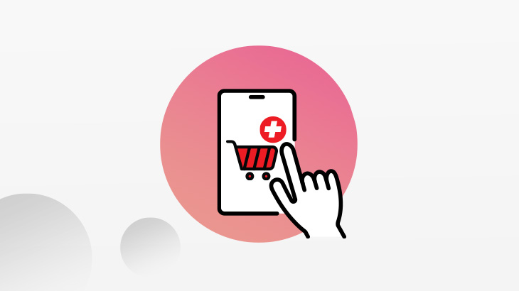 Palec wskazujacy koszyk na różowym tle.