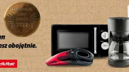 Na brązowym tle mikrofala, odkurzacz, ekspres do kawy i klimatyzator obok logo ok. i napisu "Obok tych cen nie przejdziesz obojętnie".